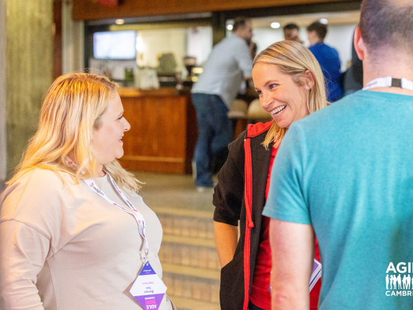 Participants smiling and talking